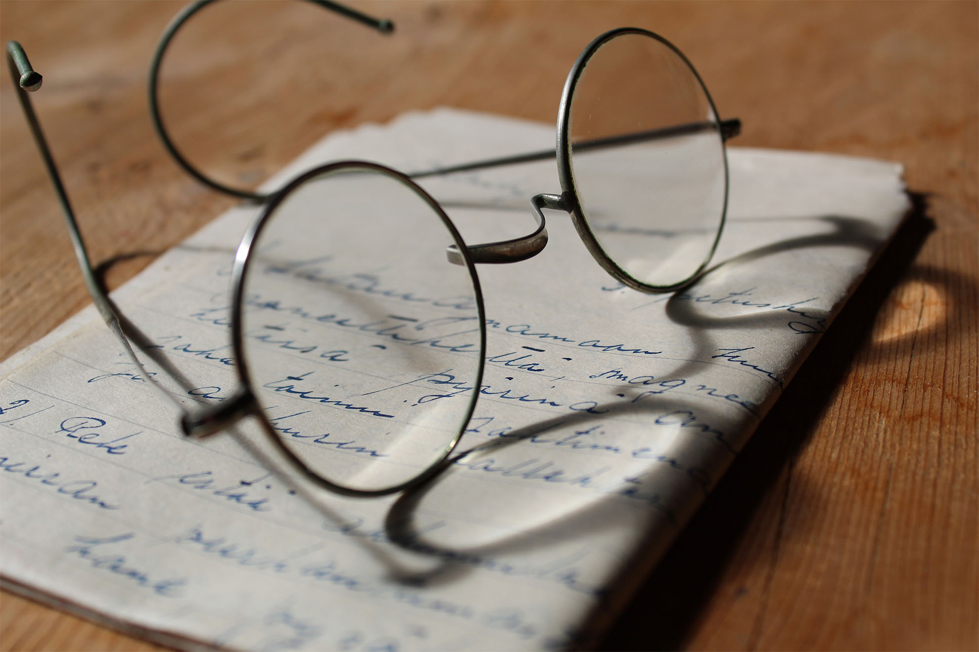 glasses on notepaper